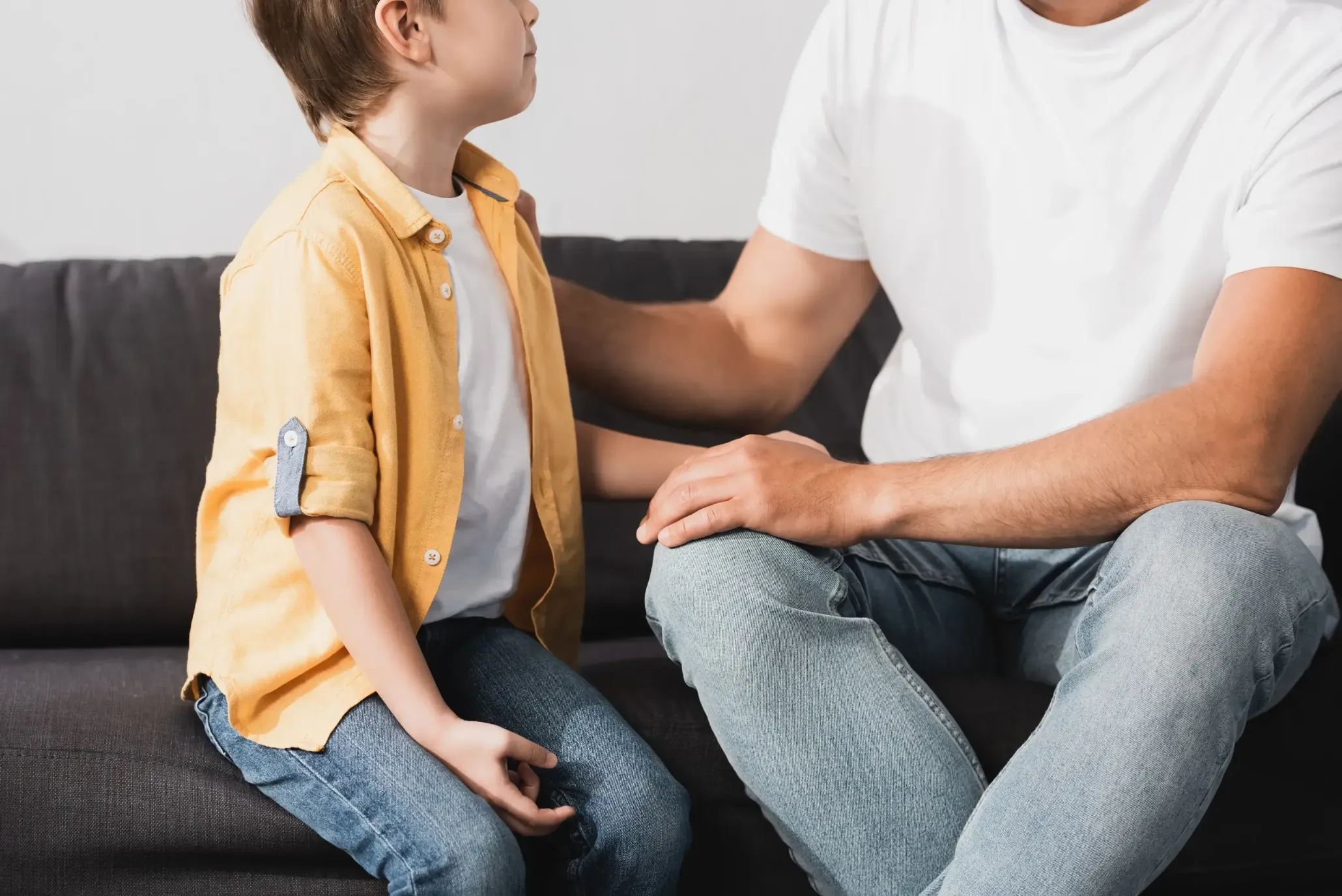 A father talking to his son.